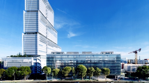 Le Thémis, ici à droite, jouxte le TGI de Paris.