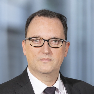 Jean-Luc Champy, White & Case.