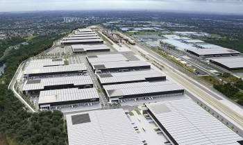 Le projet Moorebank Logistics Precinct avec, en arrière-plan, les chariots automatisés. © Axa IM Alts